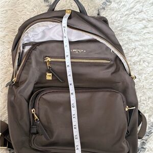 Tumi Dark Brown Backpack with Gold Accents